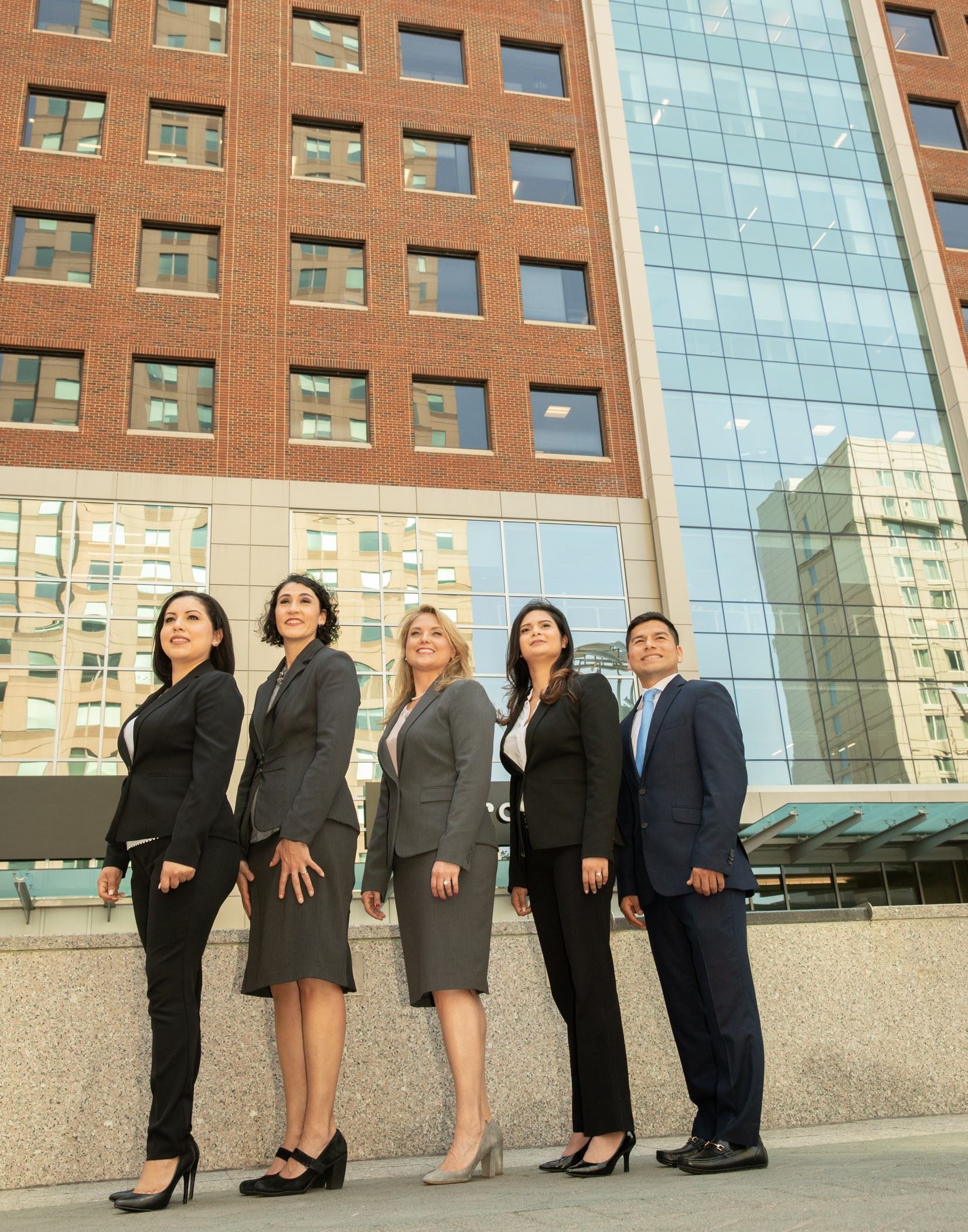 Gardner Law Attorneys standing in front of building